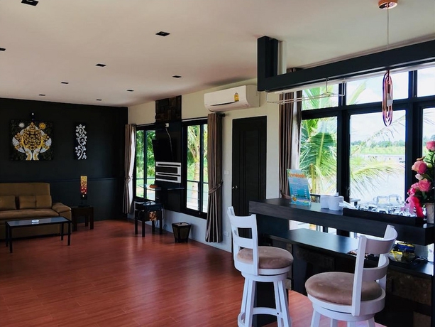 Imagen de los interiores del Hotel The Loft House Garden and Resort. Foto 18