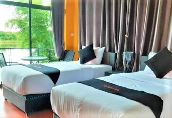 Imagen de la habitación del Hotel The Loft House Garden and Resort. Foto 17