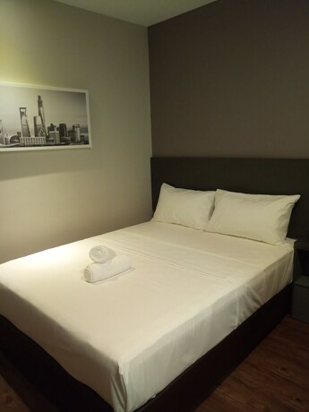 Imagen de la habitación del Hotel The Loft Plaza. Foto 15