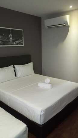Imagen de la habitación del Hotel The Loft Plaza. Foto 16