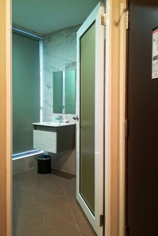 Imagen de la habitación del Hotel The Loft Plaza. Foto 22