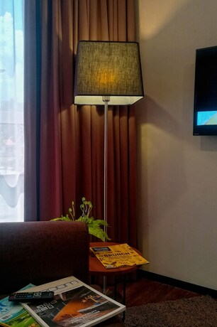 Imagen de la habitación del Hotel The Loft Plaza. Foto 25