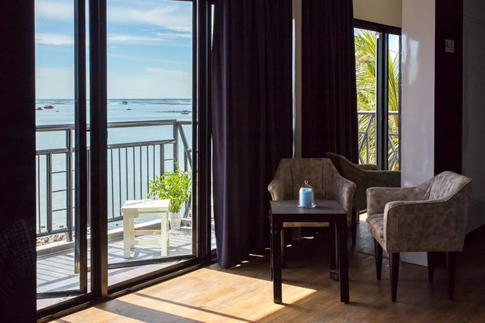 Imagen de la habitación del Hotel The Loft Seaside Sriracha. Foto 6