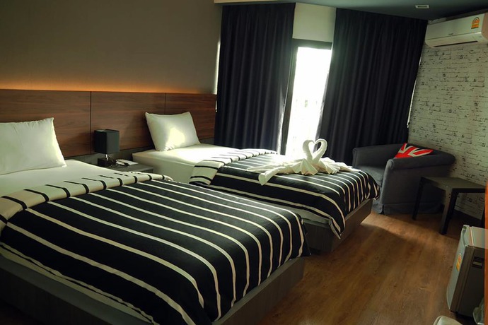 Imagen de la habitación del Hotel The Loft Seaside Sriracha. Foto 9