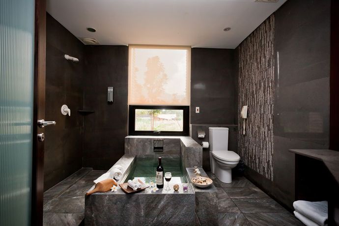 Imagen de la habitación del Hotel The Loft Seaside Suites. Foto 7