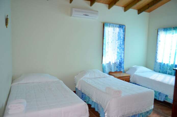 Imagen de la habitación del Hotel The Log Cab Inn Resort. Foto 15
