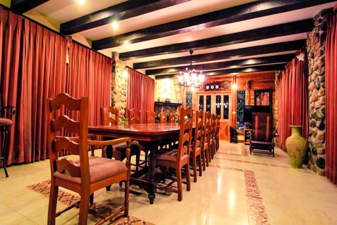 Imagen del bar/restaurante del Hotel The Log Home Experience Khao Yai. Foto 3