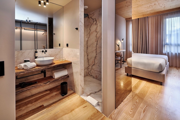 Imagen de la habitación del Hotel The Log Porto Hotel by Piamonte Hotels. Foto 7