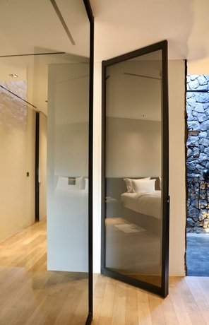 Imagen de la habitación del Hotel The Lombok Lodge Suites and Private Villas. Foto 3