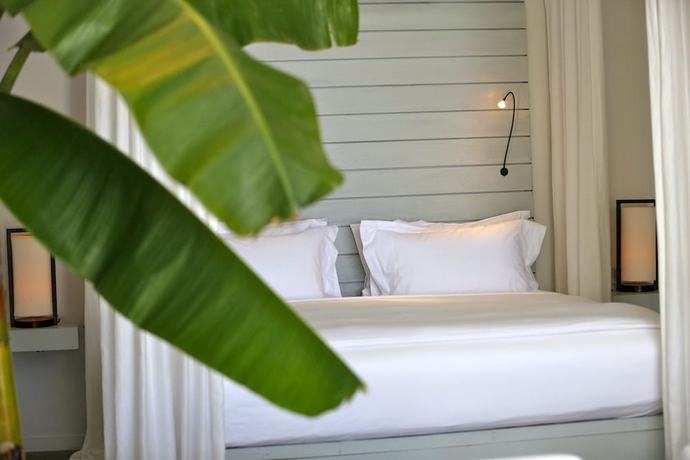 Imagen de la habitación del Hotel The Lombok Lodge Suites and Private Villas. Foto 13