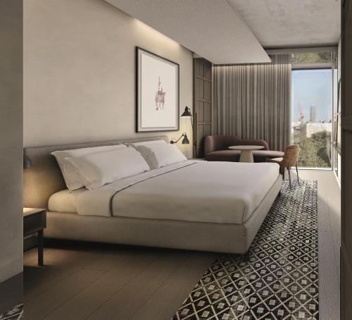 Imagen de la habitación del Hotel The Londoner. Foto 4