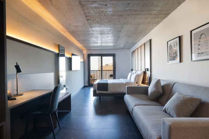 Imagen de la habitación del Hotel The Londoner Hotel St. Julians. Foto 4