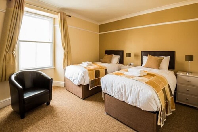 Imagen de la habitación del Hotel The Longboat Inn. Foto 4