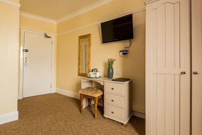 Imagen de la habitación del Hotel The Longboat Inn. Foto 5