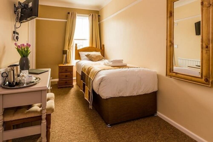 Imagen de la habitación del Hotel The Longboat Inn. Foto 7