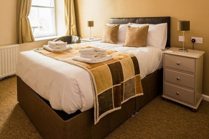 Imagen de la habitación del Hotel The Longboat Inn. Foto 8