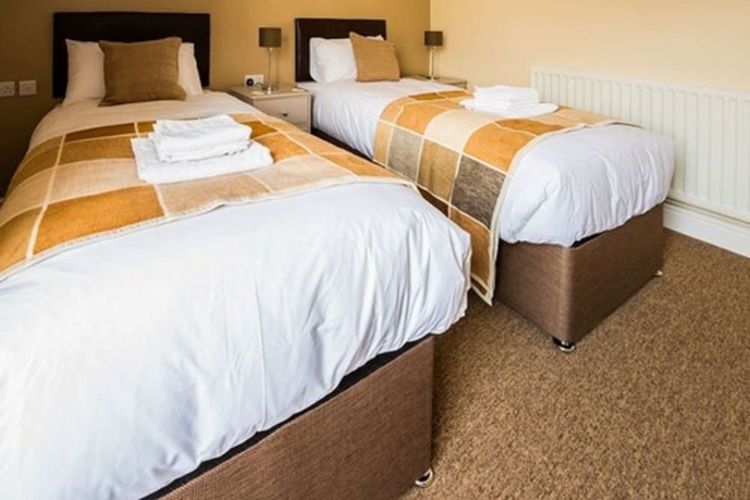 Imagen de la habitación del Hotel The Longboat Inn. Foto 11