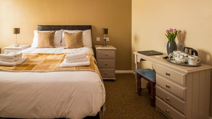 Imagen de la habitación del Hotel The Longboat Inn. Foto 12