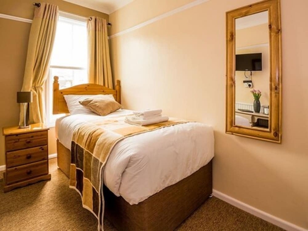 Imagen de la habitación del Hotel The Longboat Inn. Foto 15