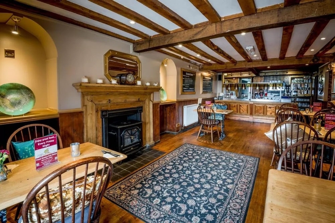 Imagen del bar/restaurante del Hotel The Longboat Inn. Foto 3