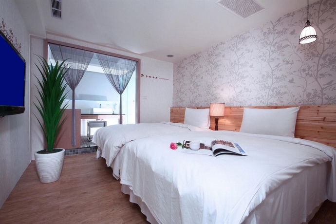 Imagen de la habitación del Hotel The Longstay. Foto 3