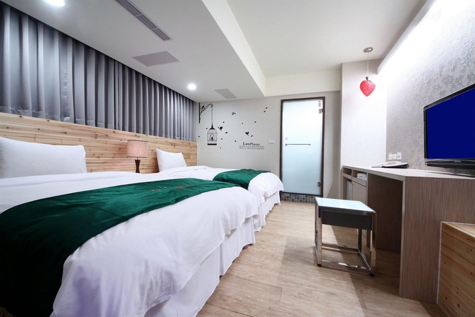 Imagen de la habitación del Hotel The Longstay. Foto 5