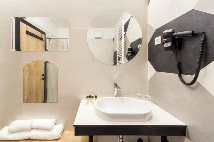 Imagen de la habitación del Hotel The Loop. Foto 4