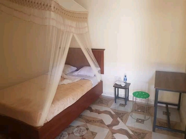 Imagen de la habitación del Hotel The Loop Guest House and Restaurant. Foto 11