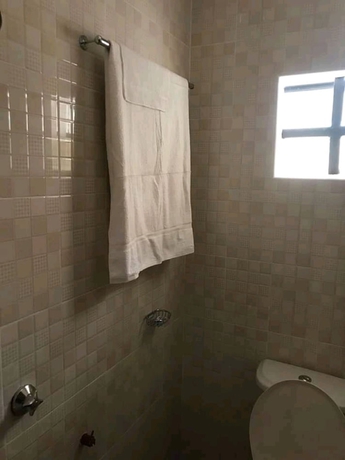 Imagen de la habitación del Hotel The Loop Guest House and Restaurant. Foto 15