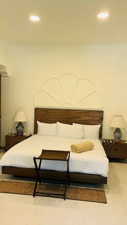 Imagen de la habitación del Hotel The Lorian Club. Foto 12