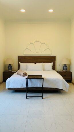 Imagen de la habitación del Hotel The Lorian Club. Foto 13