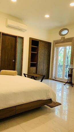 Imagen de la habitación del Hotel The Lorian Club. Foto 15