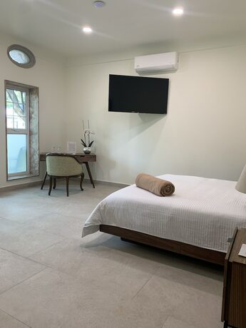 Imagen de la habitación del Hotel The Lorian Club. Foto 20