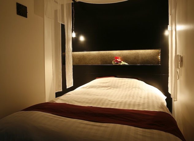 Imagen de la habitación del Hotel The Lotus Bali - Adult Only. Foto 12