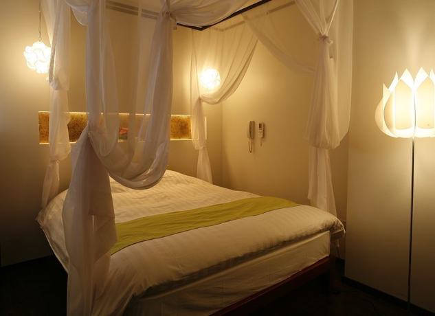 Imagen de la habitación del Hotel The Lotus Bali - Adult Only. Foto 16