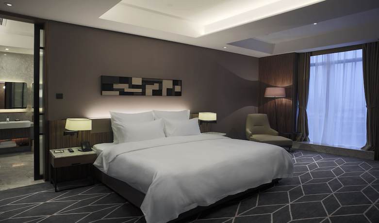 Imagen de la habitación del Hotel The Lotus Chongqing. Foto 7