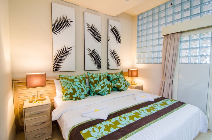 Imagen de la habitación del Hotel The Lovina. Foto 5