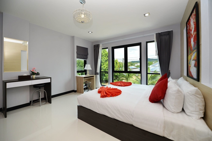 Imagen de la habitación del Hotel The Lucky Beach Ao Nang. Foto 4