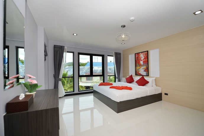 Imagen de la habitación del Hotel The Lucky Beach Ao Nang. Foto 8