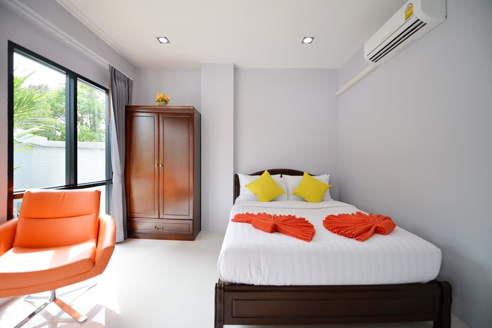 Imagen de la habitación del Hotel The Lucky Beach Ao Nang. Foto 9
