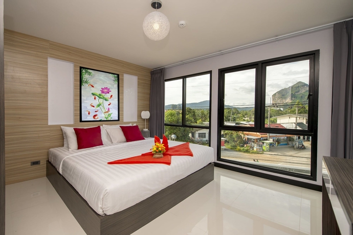 Imagen de la habitación del Hotel The Lucky Beach Ao Nang. Foto 10