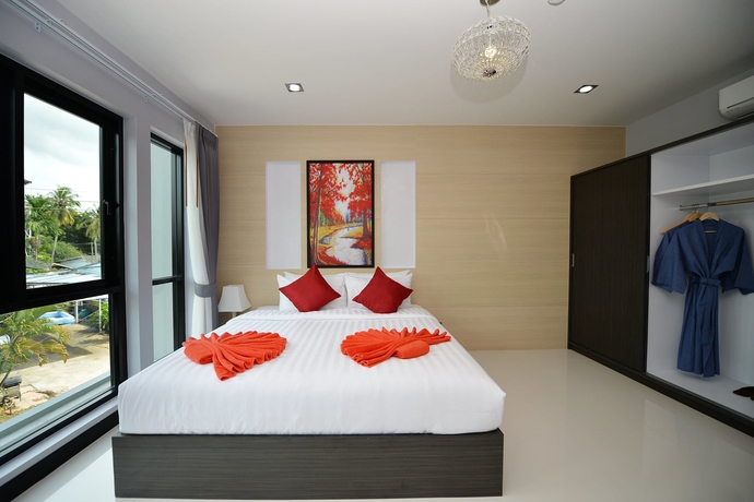Imagen de la habitación del Hotel The Lucky Beach Ao Nang. Foto 12
