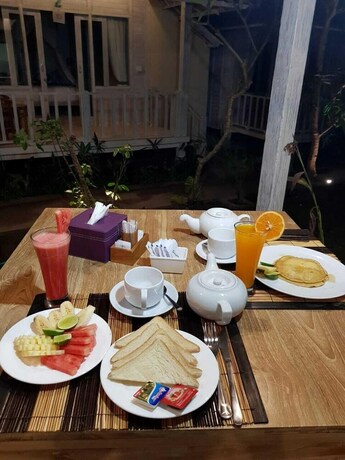 Imagen del bar/restaurante del Hotel The Lucky Cottage. Foto 21