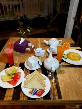 Imagen del bar/restaurante del Hotel The Lucky Cottage. Foto 22