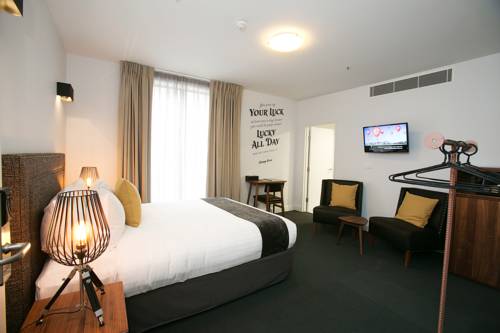 Imagen de la habitación del Hotel The Lucky. Foto 3