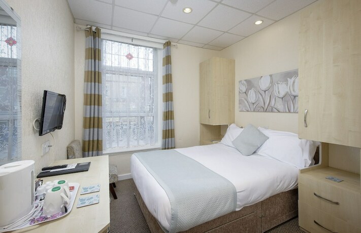 Imagen de la habitación del Hotel The Lumada. Foto 11