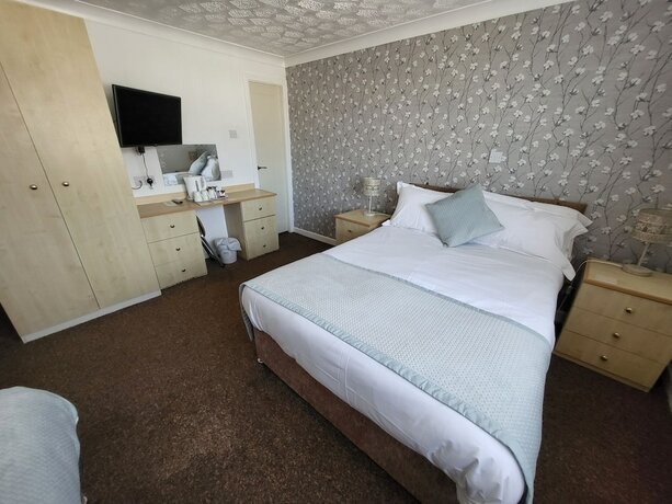 Imagen de la habitación del Hotel The Lumada. Foto 12