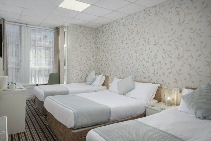 Imagen de la habitación del Hotel The Lumada. Foto 15