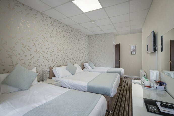 Imagen de la habitación del Hotel The Lumada. Foto 17