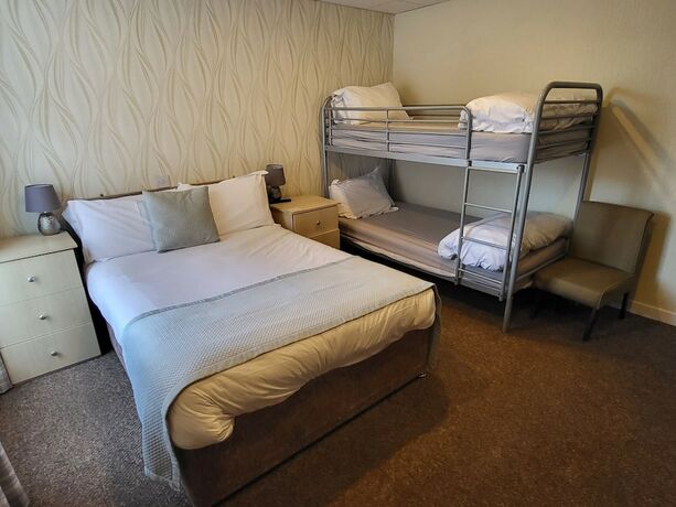 Imagen de la habitación del Hotel The Lumada. Foto 19